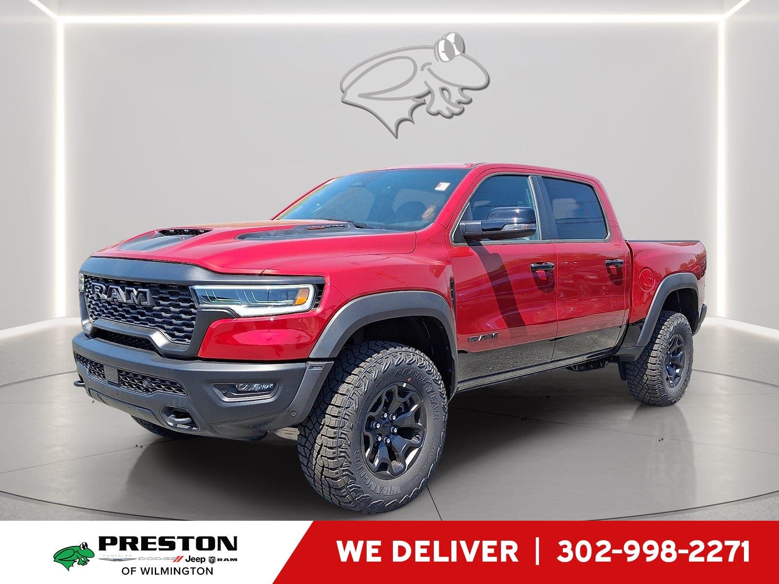 2026 RAM 1500 RHO in Molten Red Pearlcoat — front three-quarter view