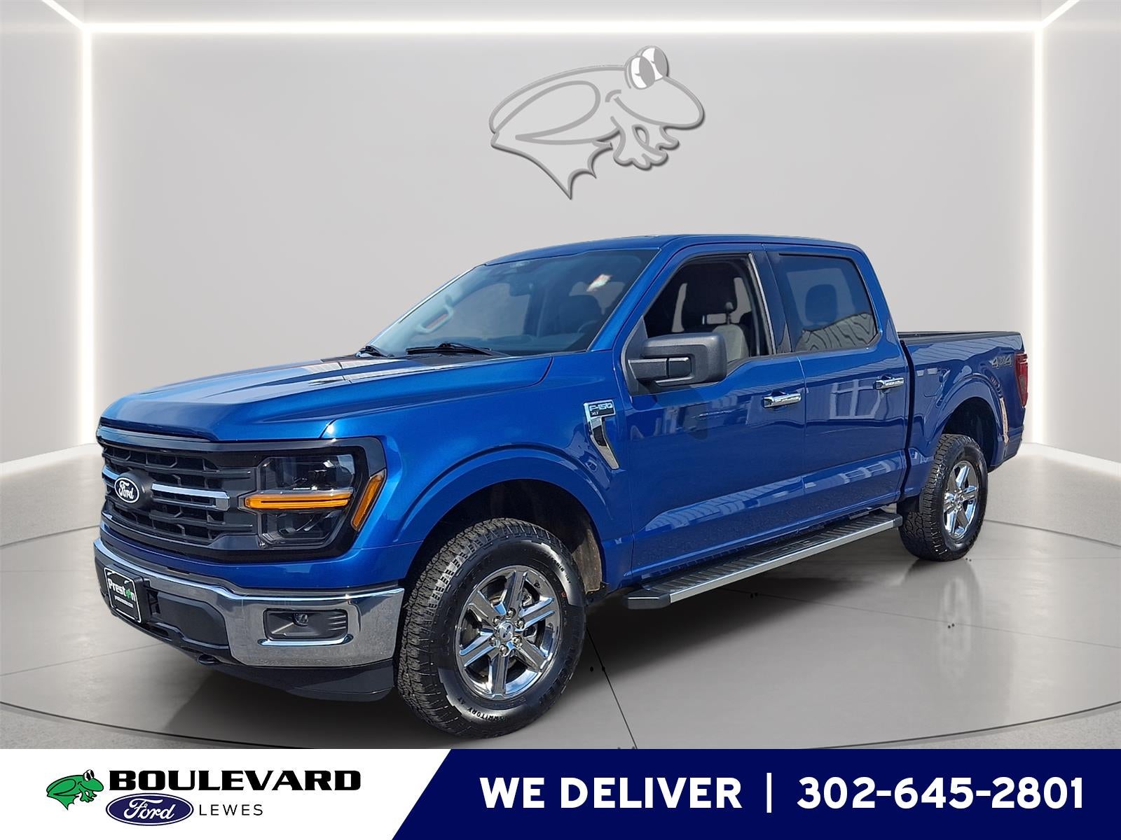 2025 Ford F-150 XLT in Atlas Blue — front three-quarter view