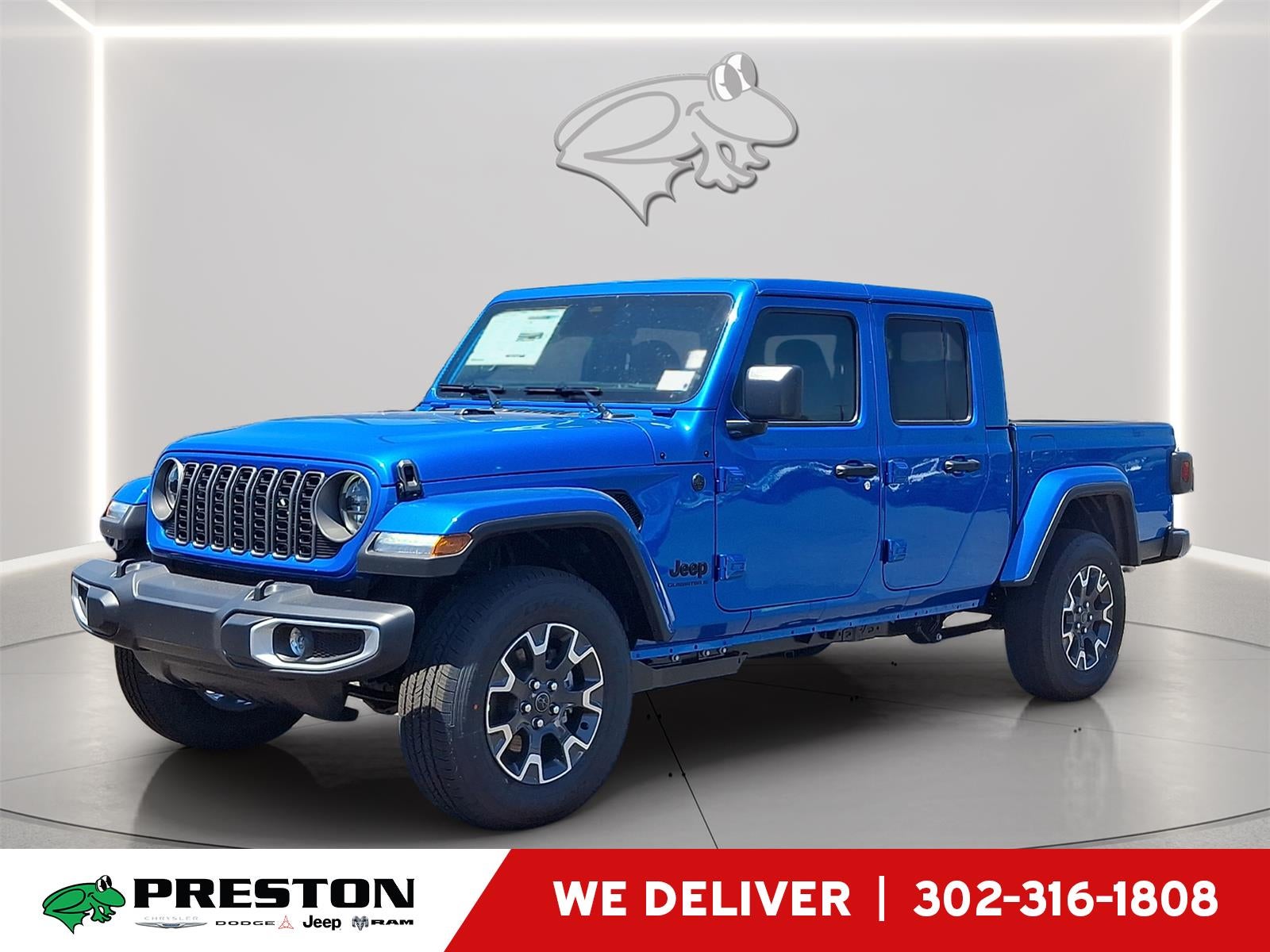 2026 Jeep Gladiator Sahara in Hydro Blue Pearlcoat — front three-quarter view
